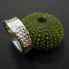 Metalclayring mit Abdruck von Seeigel